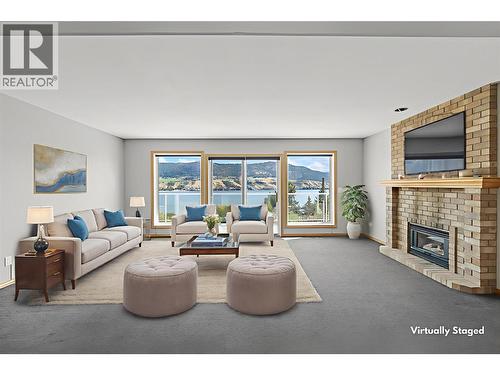 7967 Tronson Road, Vernon, BC - Indoor Photo Showing Living Room With Fireplace