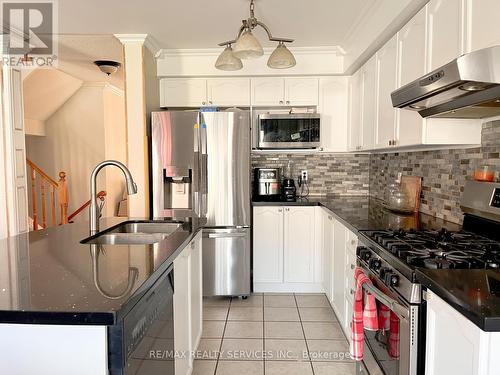 94 Four Seasons Circle, Brampton, ON - Indoor Photo Showing Kitchen With Double Sink With Upgraded Kitchen