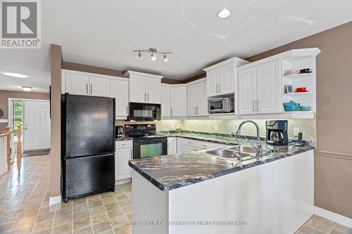 6 Shadow Lane, South Huron (Exeter), ON - Indoor Photo Showing Kitchen With Double Sink