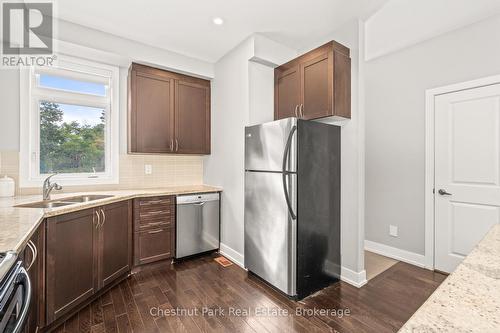 65 Rockmount Crescent, Gravenhurst (Muskoka (S)), ON - Indoor Photo Showing Kitchen With Double Sink
