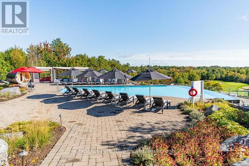 65 Rockmount Crescent, Gravenhurst (Muskoka (S)), ON - Outdoor With In Ground Pool With Deck Patio Veranda With View