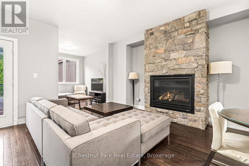 65 Rockmount Crescent, Gravenhurst (Muskoka (S)), ON - Indoor Photo Showing Living Room With Fireplace