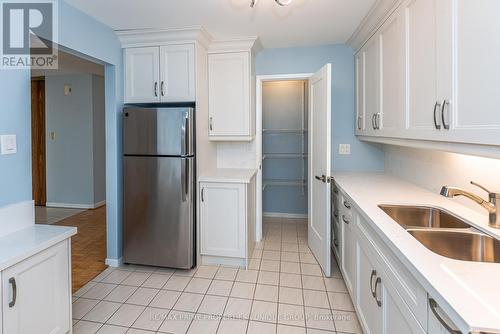 Updated kitchen with pantry - 79 - 6797 Formentera Avenue, Mississauga, ON - Indoor Photo Showing Kitchen With Double Sink
