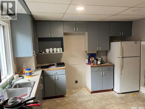 2010 1St Avenue E, Prince Albert, SK - Indoor Photo Showing Kitchen With Double Sink