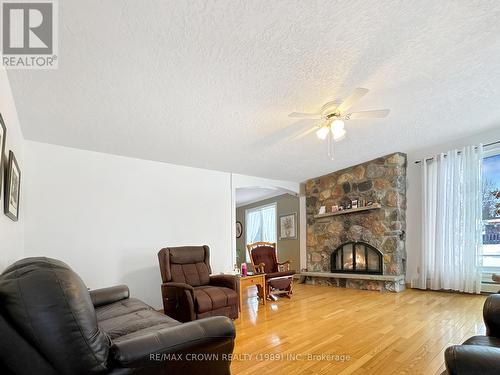 1501 West Street, Hearst, ON - Indoor Photo Showing Living Room With Fireplace