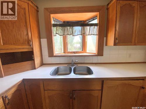 216 3Rd Street E, Frontier, SK - Indoor Photo Showing Kitchen With Double Sink