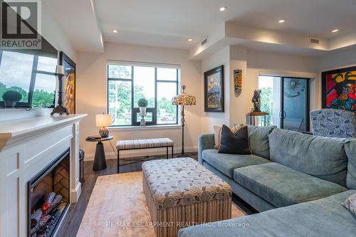 213 - 30 Hamilton Street S, Hamilton, ON - Indoor Photo Showing Living Room With Fireplace