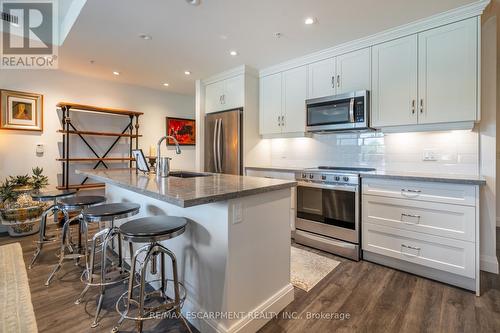 213 - 30 Hamilton Street S, Hamilton, ON - Indoor Photo Showing Kitchen With Upgraded Kitchen