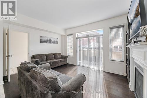 34 Pennycross Crescent, Brampton, ON - Indoor Photo Showing Living Room With Fireplace
