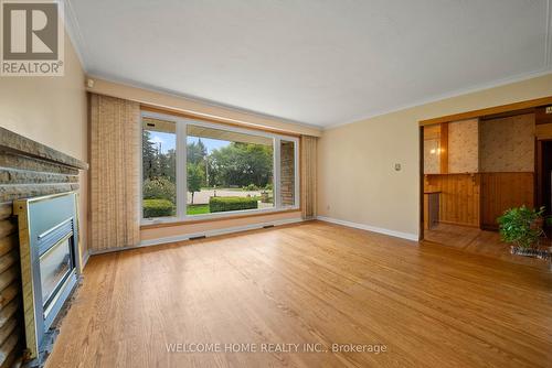 10 Pengelly Court, Toronto, ON - Indoor Photo Showing Living Room With Fireplace