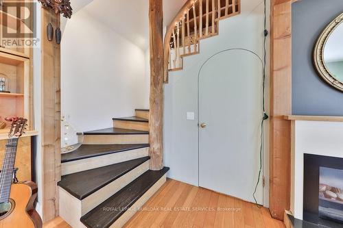 39 Twenty Fourth Street, Toronto, ON - Indoor Photo Showing Other Room With Fireplace