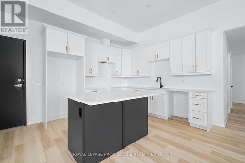 201 - 941 Charles Wilson Parkway, Cobourg, ON - Indoor Photo Showing Kitchen