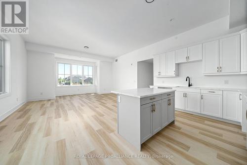 202 - 941 Charles Wilson Parkway, Cobourg, ON - Indoor Photo Showing Kitchen