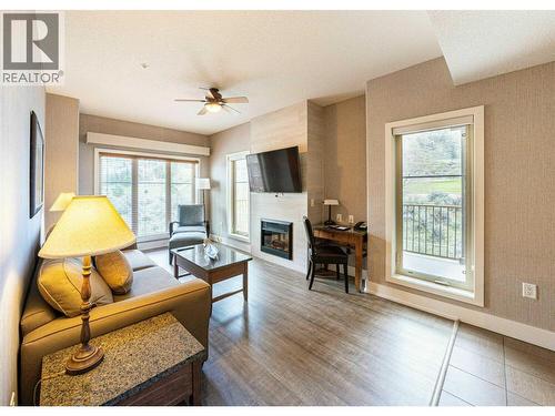 1200 Rancher Creek Road Road Unit# 328C, Osoyoos, BC - Indoor Photo Showing Living Room With Fireplace