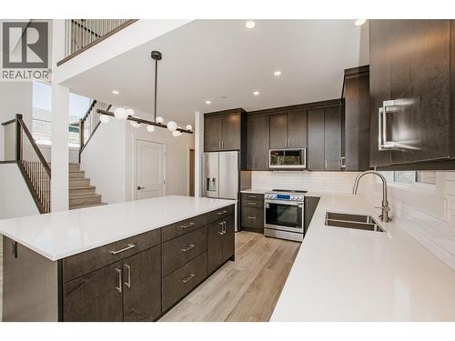 8200 97A Highway Unit# 8, Mara, BC - Indoor Photo Showing Kitchen With Double Sink With Upgraded Kitchen