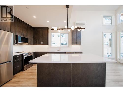 8200 97A Highway Unit# 8, Mara, BC - Indoor Photo Showing Kitchen With Upgraded Kitchen
