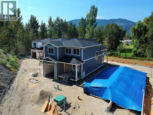Photo for likeness reference (Unit 3) - 8200 97A Highway Unit# 8, Mara, BC - Outdoor With In Ground Pool With Deck Patio Veranda