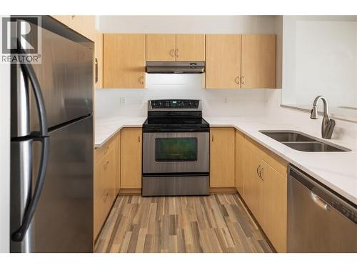 563 Yates Road Unit# 205, Kelowna, BC - Indoor Photo Showing Kitchen With Double Sink