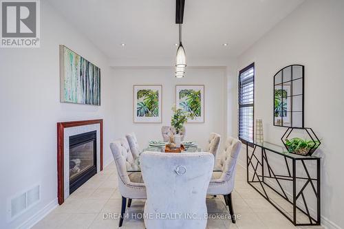 3519 Trilogy Trail, Mississauga, ON - Indoor Photo Showing Dining Room With Fireplace