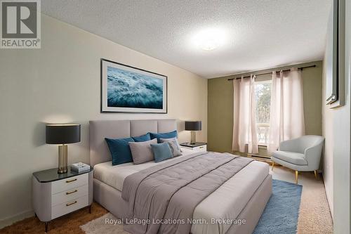 Virtually Staged Primary Bedroom - 1 - 891 River Road W, Wasaga Beach, ON - Indoor Photo Showing Bedroom