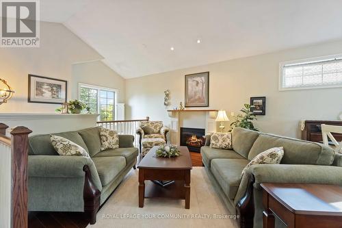 61 Frontier Drive, Niagara-On-The-Lake, ON - Indoor Photo Showing Living Room With Fireplace