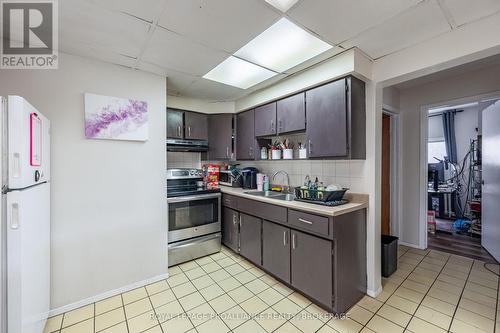 271-273 Rideau Street, Kingston (East Of Sir John A. Blvd), ON - Indoor Photo Showing Kitchen With Double Sink