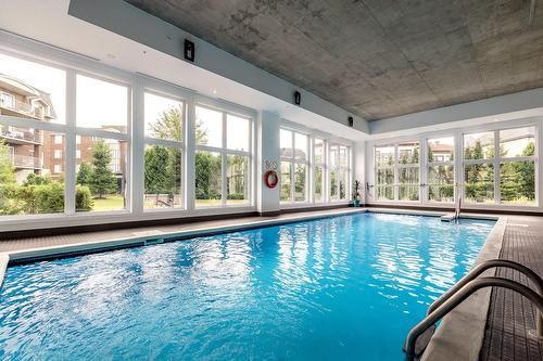 Pool - 102-104-3950 Rue Claude-Henri-Grignon, Montréal (Saint-Laurent), QC - Indoor Photo Showing Other Room With In Ground Pool