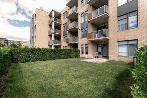 Backyard - 102-104-3950 Rue Claude-Henri-Grignon, Montréal (Saint-Laurent), QC - Outdoor With Facade