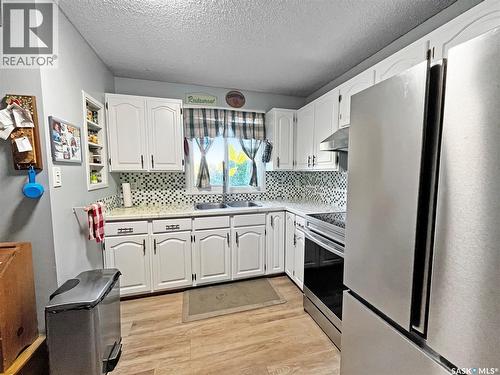 2450 15Th Avenue E, Prince Albert, SK - Indoor Photo Showing Kitchen With Double Sink