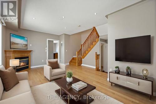 7173 Village Walk, Mississauga, ON - Indoor Photo Showing Living Room With Fireplace