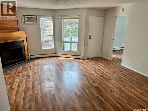 203 423 4Th Avenue N, Saskatoon, SK - Indoor With Fireplace
