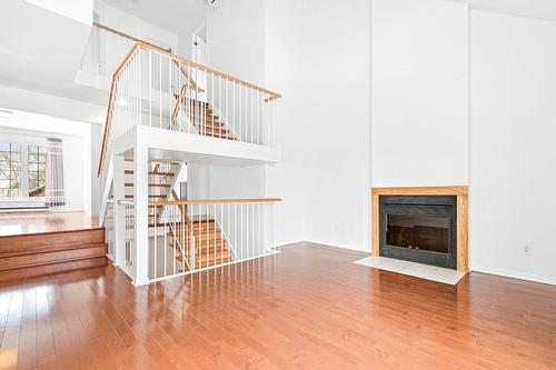 Salon - 18113 Rue Rousson, Montréal (Pierrefonds-Roxboro), QC - Indoor With Fireplace