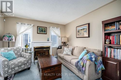 5 Empire Boulevard, Prince Edward County (Wellington), ON - Indoor Photo Showing Living Room With Fireplace