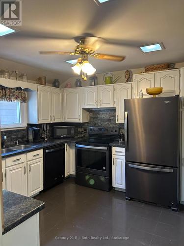 234 Lake Dalrymple Road, Kawartha Lakes (Carden), ON - Indoor Photo Showing Kitchen With Double Sink