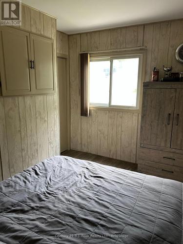 234 Lake Dalrymple Road, Kawartha Lakes (Carden), ON - Indoor Photo Showing Bedroom