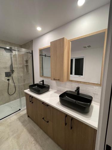 Salle de bains attenante à la CCP - 6535 Rue Poitou, Brossard, QC - Indoor Photo Showing Bathroom