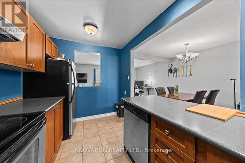 Cut out to the living room - 82 Stokes Crescent E, Ottawa, ON - Indoor Photo Showing Kitchen
