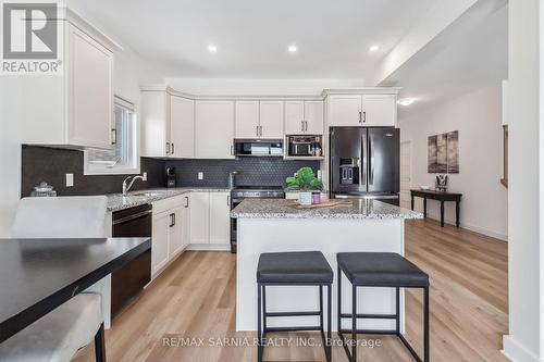 63 Rosina Lane, Zorra (Thamesford), ON - Indoor Photo Showing Kitchen With Double Sink With Upgraded Kitchen