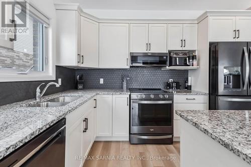 63 Rosina Lane, Zorra (Thamesford), ON - Indoor Photo Showing Kitchen With Double Sink With Upgraded Kitchen