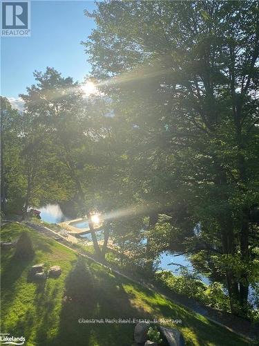 Sun setting from the balcony - 304 - 200 Anglo Street, Bracebridge (Macaulay), ON - Outdoor With Body Of Water With View