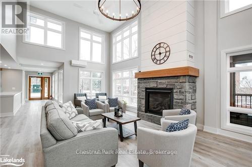 The social heart of the community - 304 - 200 Anglo Street, Bracebridge (Macaulay), ON - Indoor Photo Showing Living Room With Fireplace
