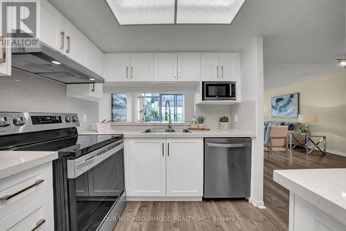 304 - 25 Cumberland Lane, Ajax (South West), ON - Indoor Photo Showing Kitchen With Stainless Steel Kitchen With Double Sink
