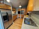 102 Chase Road, Christina Lake, BC  - Indoor Photo Showing Kitchen With Double Sink 