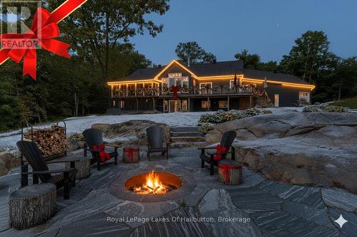 AI generated winter scene - 1143 Trillium Trail, Dysart Et Al (Dudley), ON - Outdoor With Deck Patio Veranda