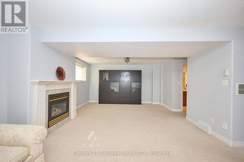 358 Antoinette Road, Fort Erie (Lakeshore), ON - Indoor Photo Showing Living Room With Fireplace