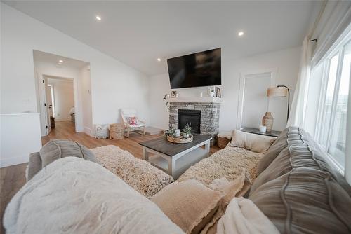 107 18Th Street, Cranbrook, BC - Indoor Photo Showing Living Room With Fireplace