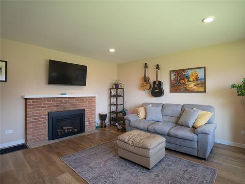 2205 Sparton Drive, Penticton, BC - Indoor Photo Showing Living Room With Fireplace