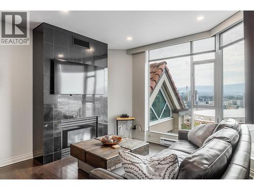 1152 Sunset Drive Unit# 1601, Kelowna, BC - Indoor Photo Showing Living Room With Fireplace