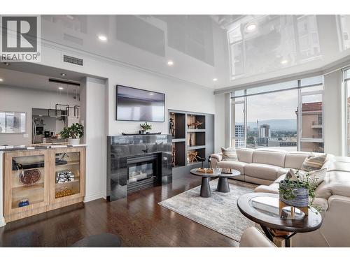1152 Sunset Drive Unit# 1601, Kelowna, BC - Indoor Photo Showing Living Room With Fireplace