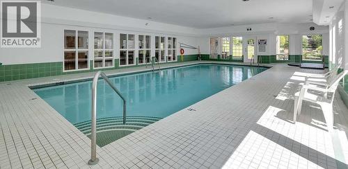 615 Glenmeadows Road Unit# 98, Kelowna, BC - Indoor Photo Showing Other Room With In Ground Pool